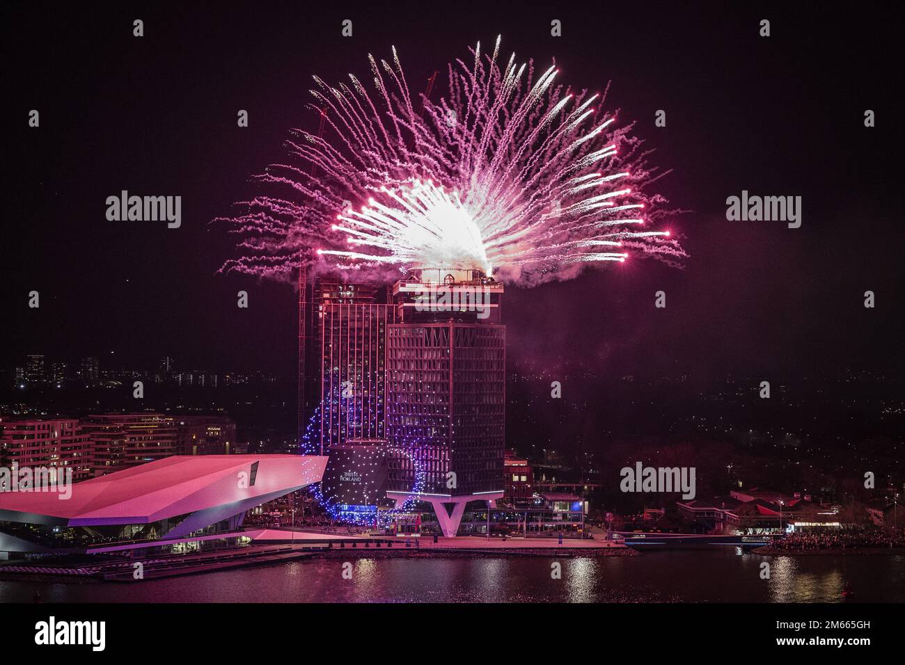 AMSTERDAM - Drones and fireworks during a show around the A'DAM Tower, two days after New Year's Eve. The show with six hundred drones was supposed to be held in Amsterdam North on Saturday evening, but was canceled due to bad weather. The municipality of Amsterdam wants to start a new tradition with professional shows for the turn of the year, with less damage, violence and nuisance. ANP DINGENA MOL netherlands out - belgium out Stock Photo