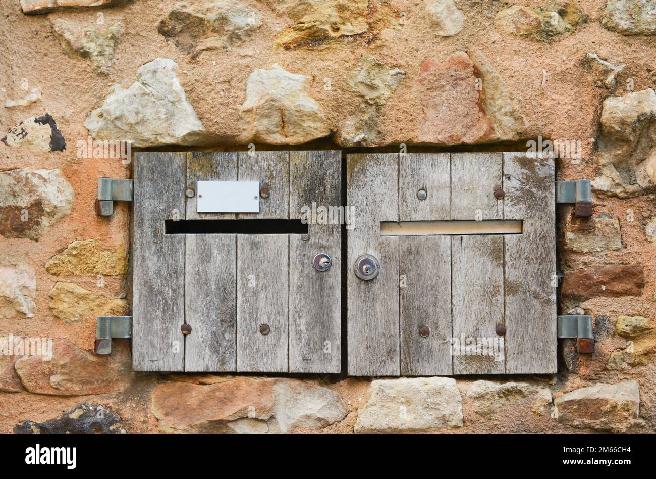 Old wood postbox. Stock Photo