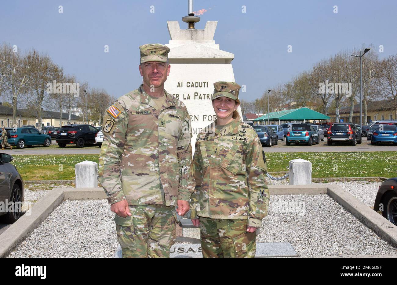 Maj. Gen. Michele Bredenkamp, the U.S. Army Intelligence and Security Command (INSCOM) commanding general, right, and Maj. Gen. Andrew M. Rohling, the U.S. Army Southern European Task Force, Africa commander, meet in front of the Eternal Flame memorial on Caserma Ederle during Bredenkamp’s visit to Vicenza, Italy, Apr. 7, 2022. Stock Photo