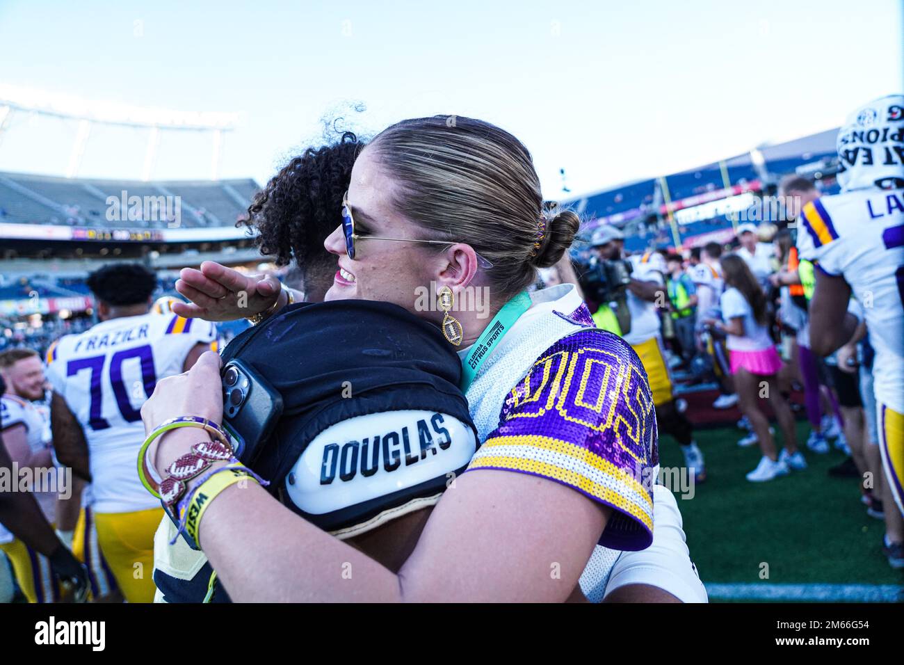 Orlando, Florida, USA, January 2, 2023, LSU player greets a fan after