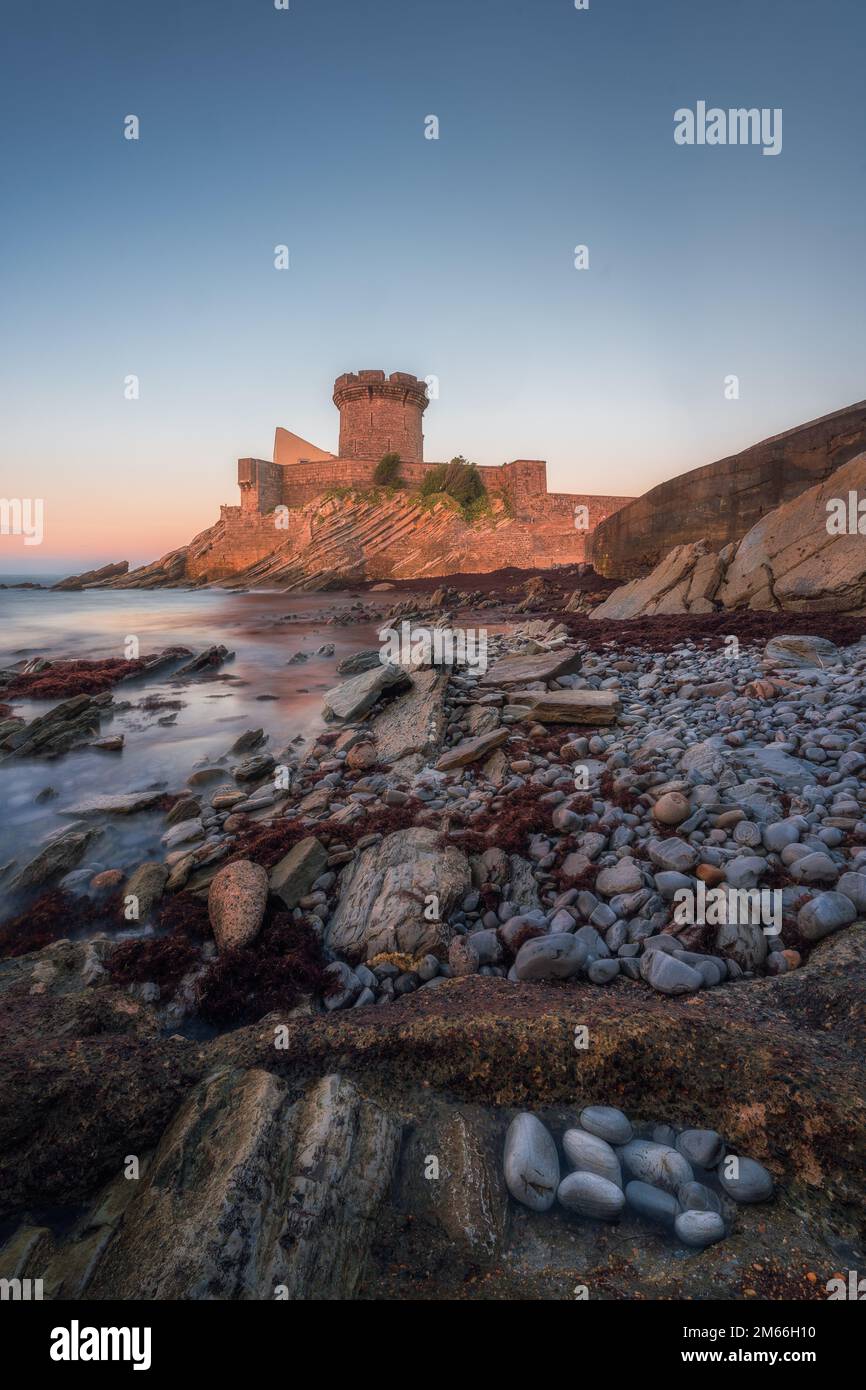 Fort de Socoa at sunset, with unique flysch landform in Ciboure and