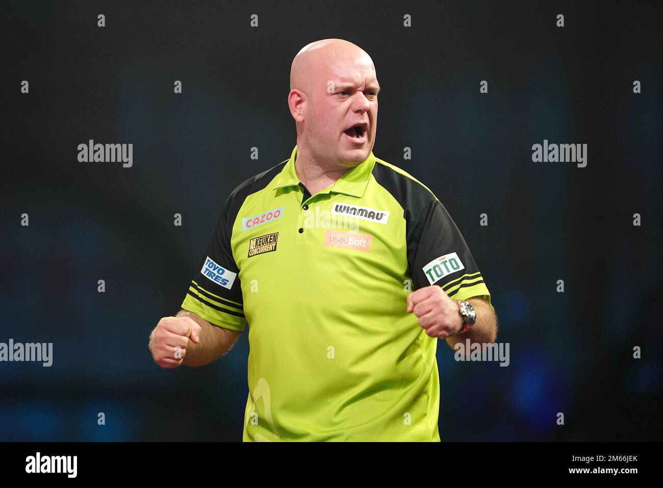 Michael van Gerwen in action against Dimitri Van den Bergh during day  fifteen of the Cazoo World Darts Championship at Alexandra Palace, London.  Picture date: Monday January 2, 2023 Stock Photo - Alamy
