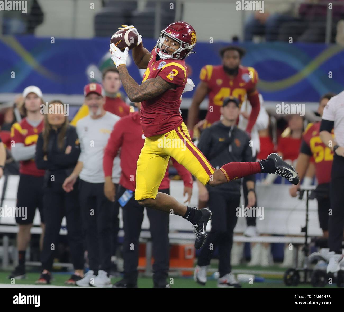 Dallas, TX, USA. 1st Jan, 2023. USC's Brenden Rice (2) leaps up to