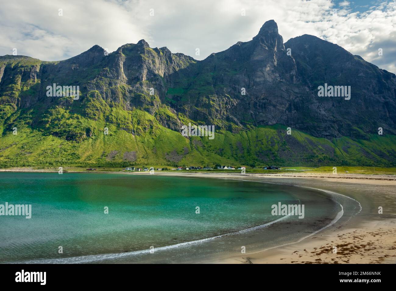 The crystal clear water of the Ersfjordstranda beach in Senja Island ...