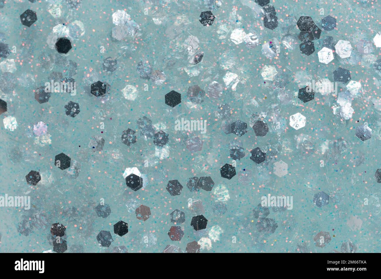 Light blue color sparkle slime texture background close up view Stock Photo