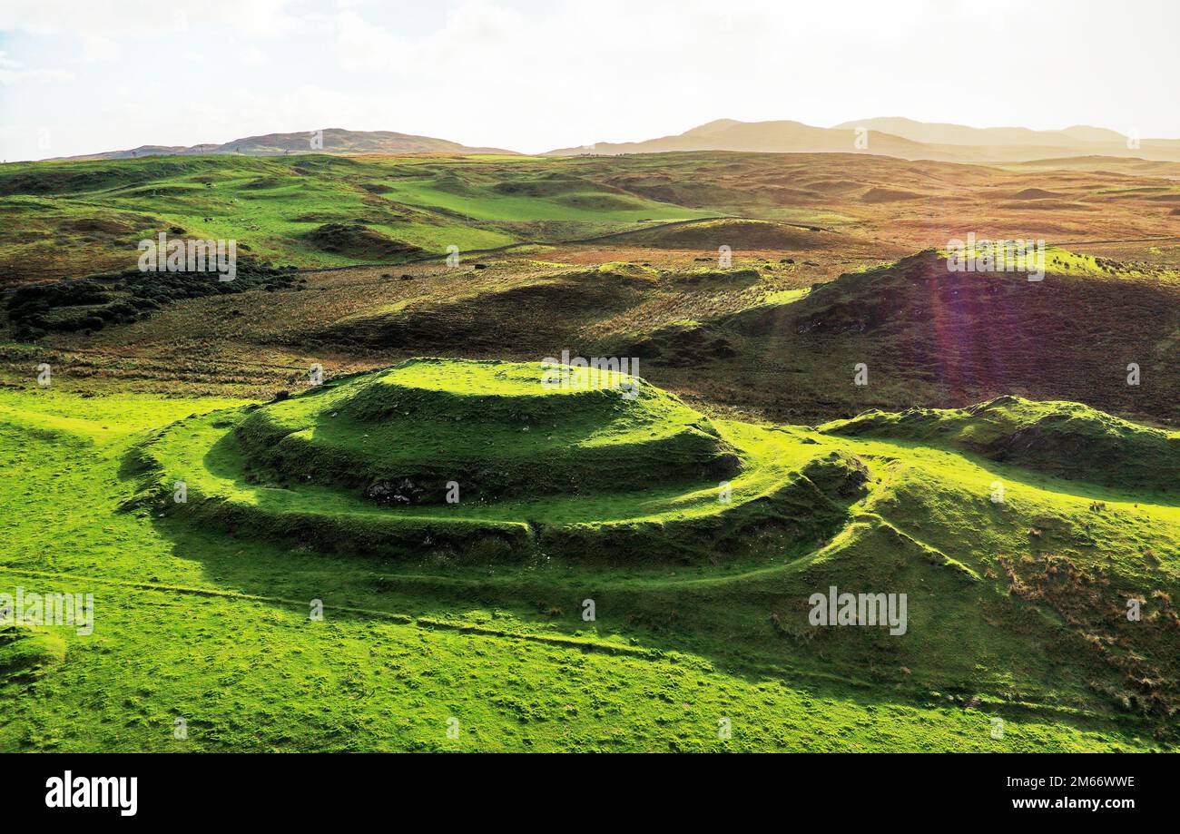 Dun Guaidhre multivalate prehistoric Iron Age fort hillfort. Kilmeny, Islay, Inner Hebrides, Scotland. Aerial. Looking East Stock Photo