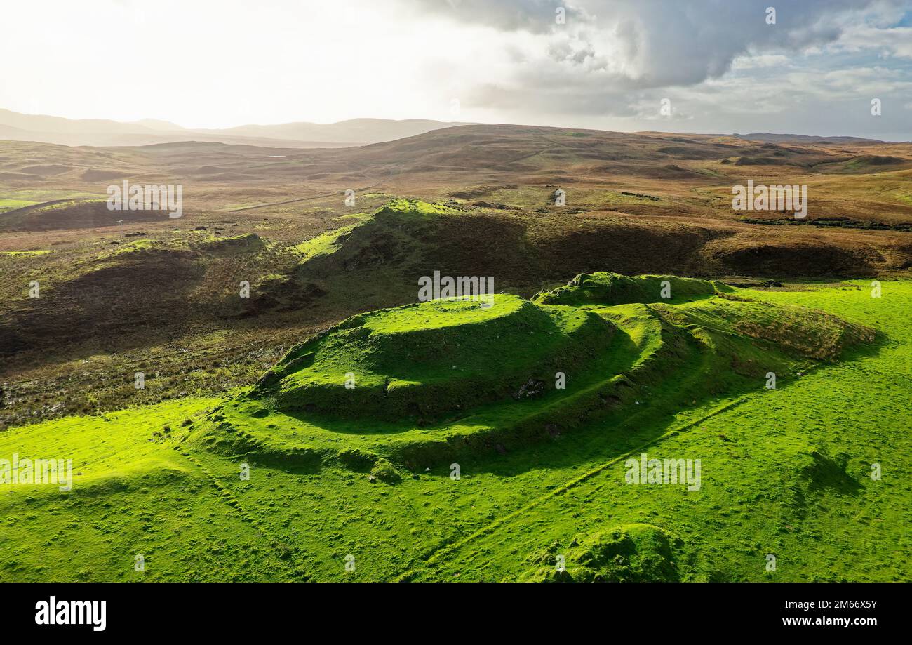 Dun Guaidhre multivalate prehistoric Iron Age fort hillfort. Kilmeny, Islay, Inner Hebrides, Scotland. Aerial. Looking South Stock Photo