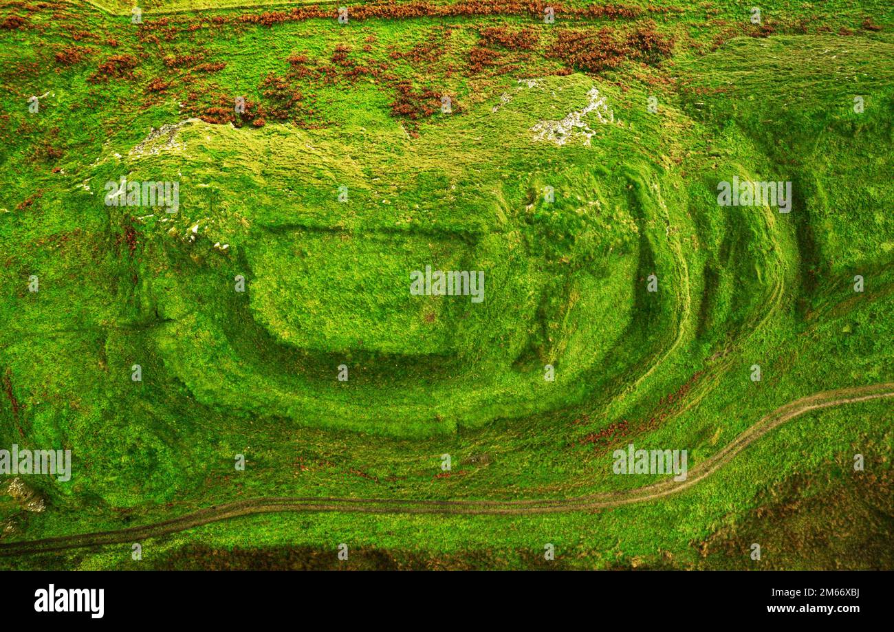 Dun Nosebridge multivalate prehistoric Iron Age fort hillfort above the River Laggan, Islay, Inner Hebrides, Scotland. Aerial. Looking S.E. Stock Photo