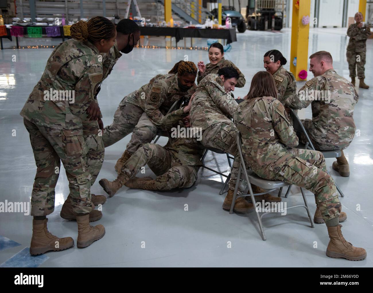 Airmen from the 635th Materiel Maintenance Squadron play musical chairs ...