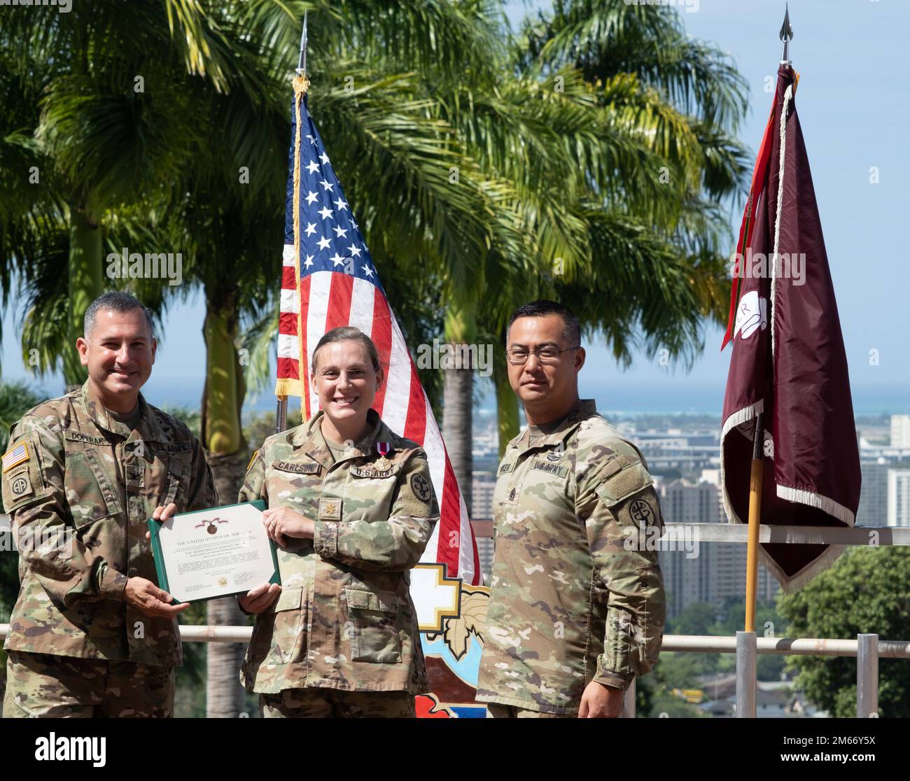 Maj. Angela Carlson receives Meritorious Service Medal. (from left) Col