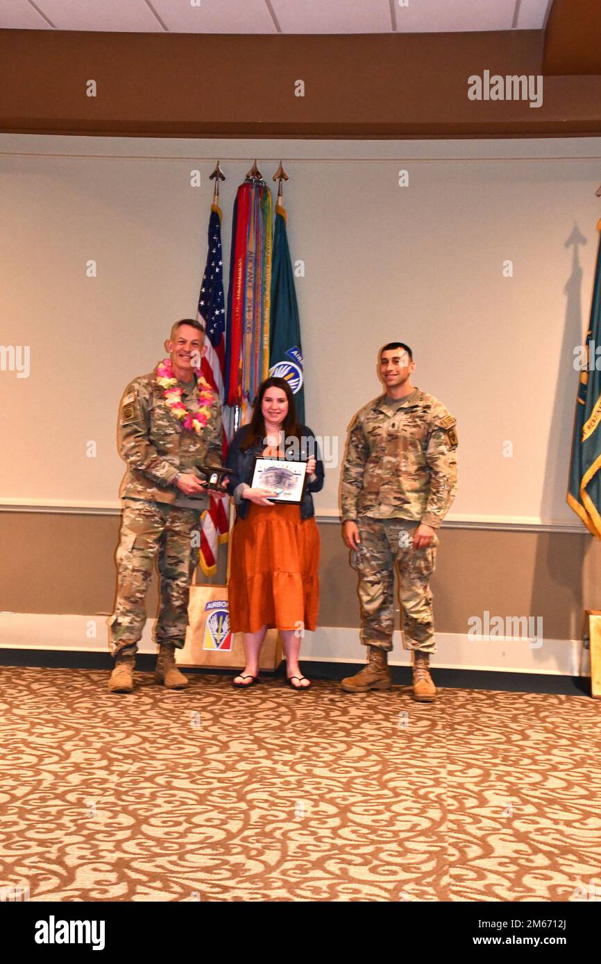 Marissa schuhlein was named installation volunteer of the year stands