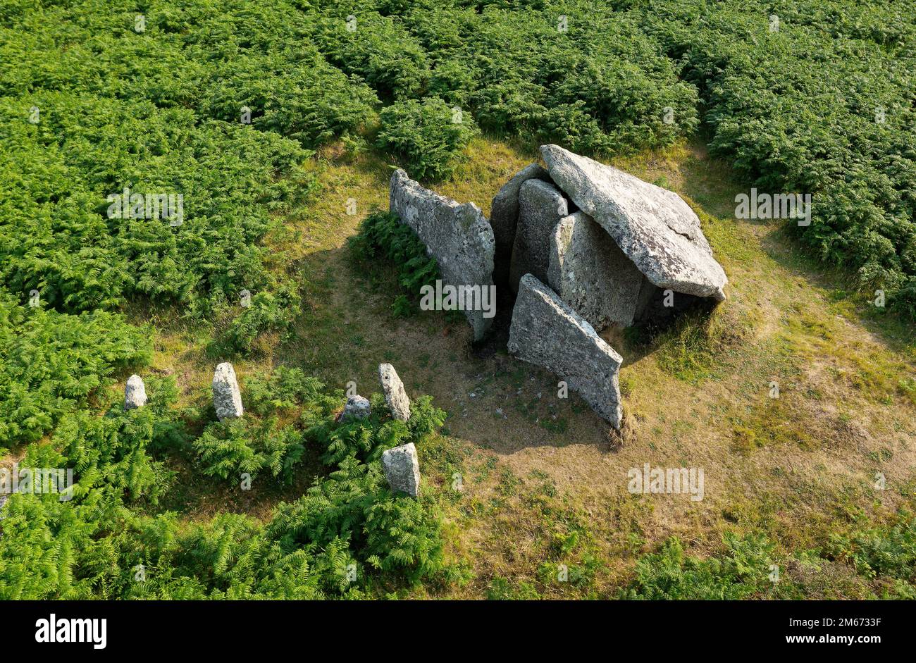 Zennor Quoit prehistoric entrance grave chambered tomb. Penwith peninsula, Cornwall. Aerial showing entrance façade, chamber uprights, capstone etc. Stock Photo
