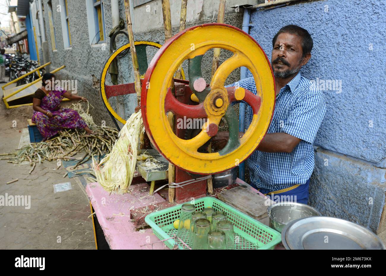 A Sugarcane juice stall in Madurai, Tamil Nadu, India. Stock Photo