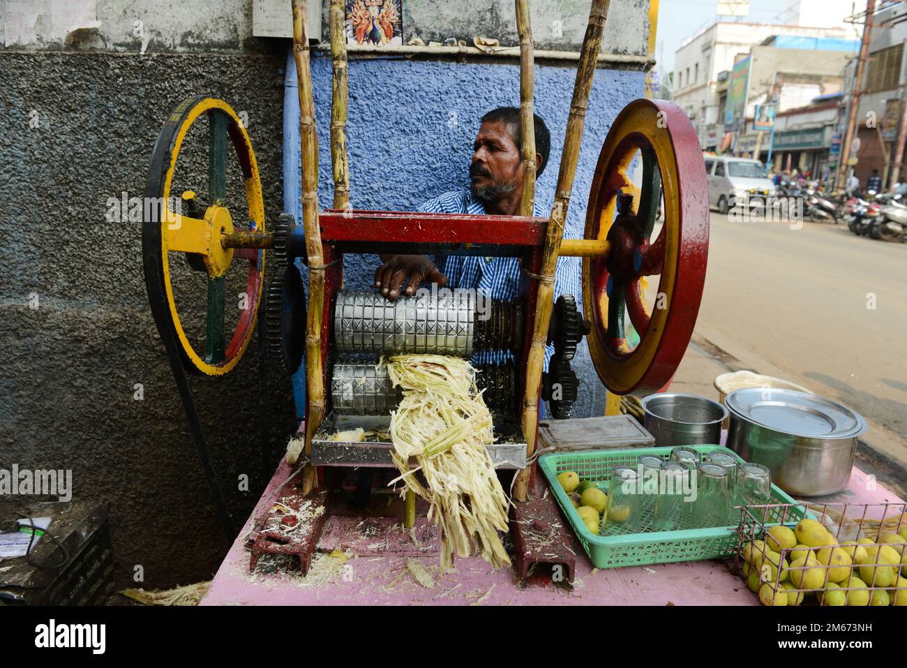 A Sugarcane juice stall in Madurai, Tamil Nadu, India. Stock Photo