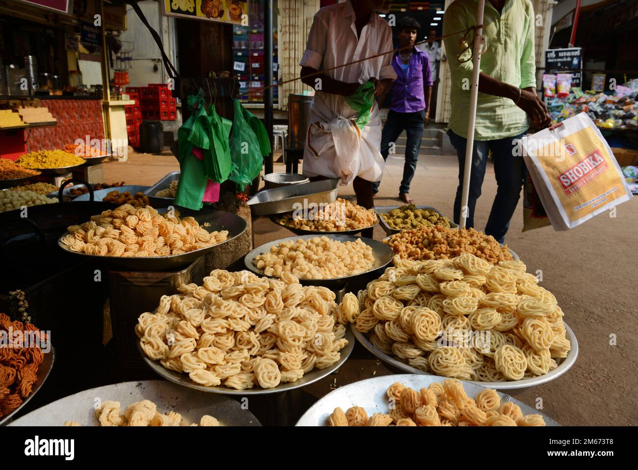 A Tamil savory snack vendor in Madurai, Tamil Nadu, India Stock Photo