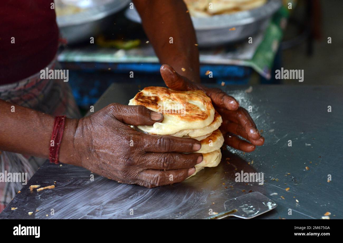 Roti / Paratha bread prepared in a small restaurant in Madurai, Tamil Nadu, India. Stock Photo