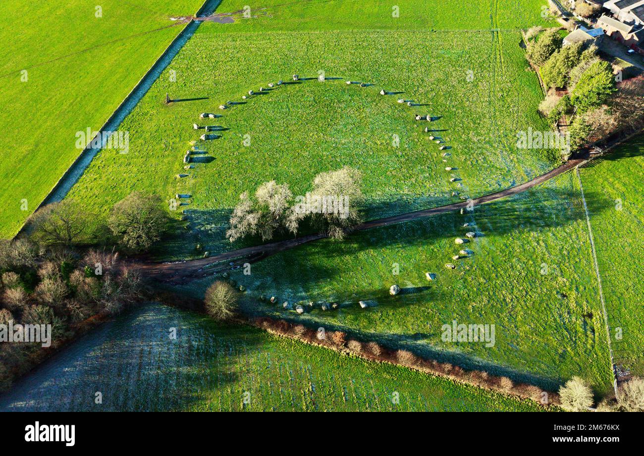 Long Meg and Her Daughters. Prehistoric Neolithic stone circle. Langwathby, Cumbria, UK. Aerial of circle and outlier stone with winter hoar frost Stock Photo