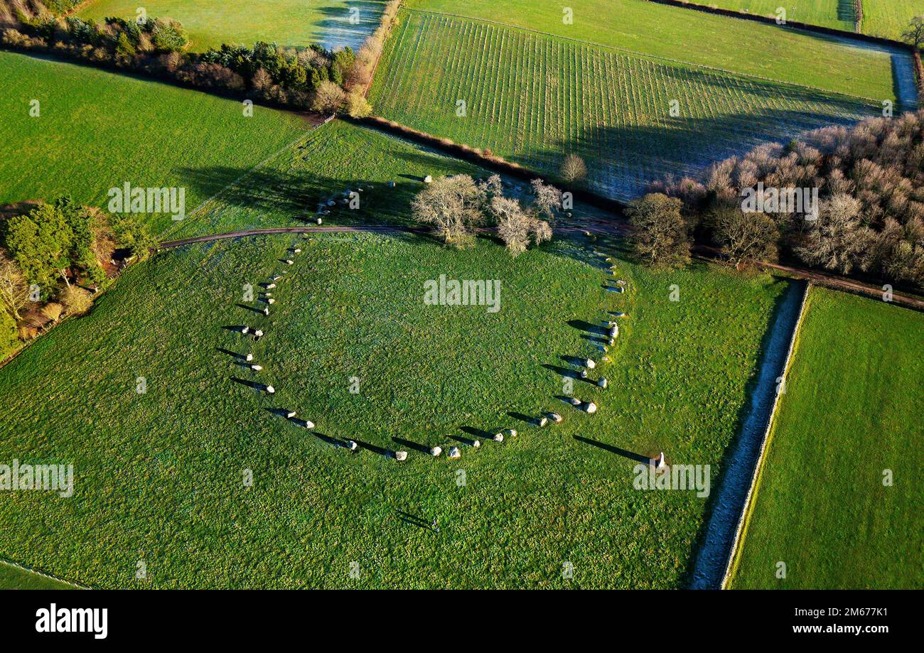 Long Meg and Her Daughters. Prehistoric Neolithic stone circle. Langwathby, Cumbria, UK. Aerial of circle and outlier stone with winter hoar frost Stock Photo