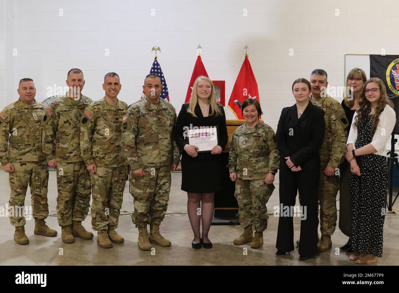 Lily Palfrey, daughter of 1st Sgt. Frank Palfrey, receives the 2020 ...