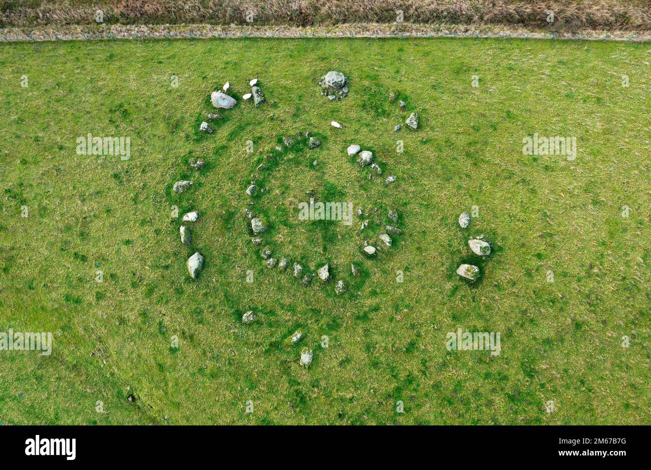 Gunnerkeld concentric stone circle near Shap, Cumbria. Granite stone prehistoric site. Inner circle is kerb of original stone and earth cairn Stock Photo