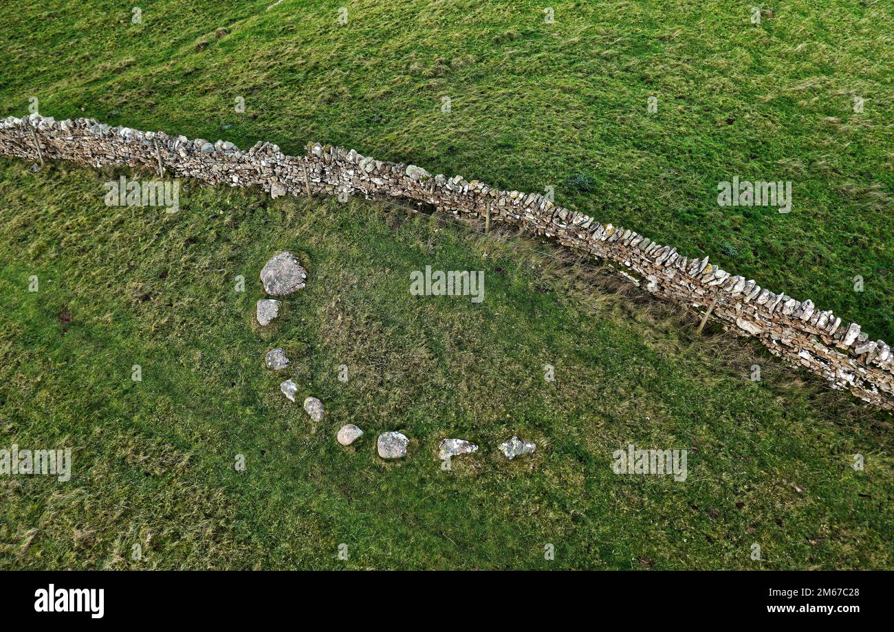 Iron Hill North stone circle 5km E. of Shap, Cumbria. Remaining stones of kerb of a bowl barrow burial mound common late Neolithic to late Bronze Age Stock Photo