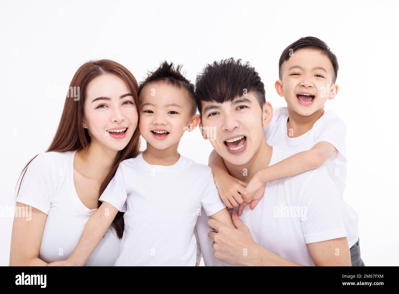 Happy Asian family isolated on white background Stock Photo