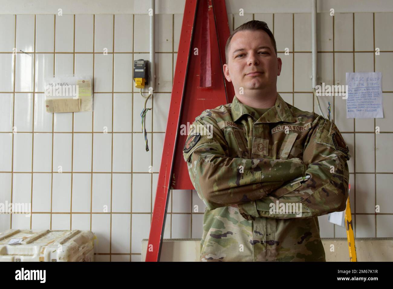 U.S. Air Force Master Sgt. Kyle Shoup, 86th Maintenance Squadron Air Force Repair Enhancement Program manager, poses for a photo in the AFREP workshop at Ramstein Air Base, Germany, April 12, 2022. Since accepting items for repair in February, AFREP has saved the Air Force approximately $90,000 in cost avoidance. Stock Photo