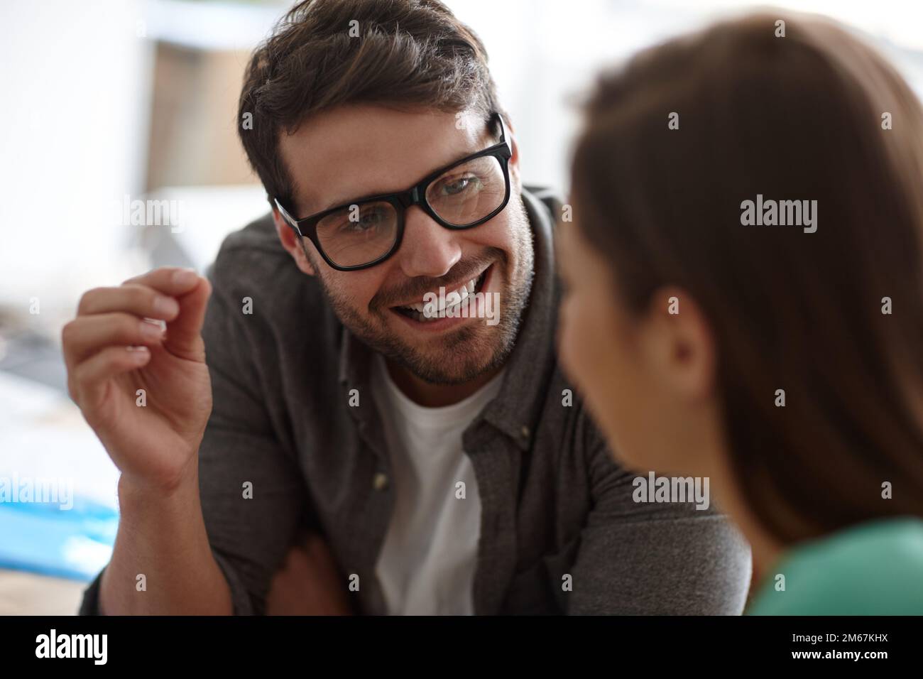 Handsome man explaining details hi-res stock photography and images - Alamy