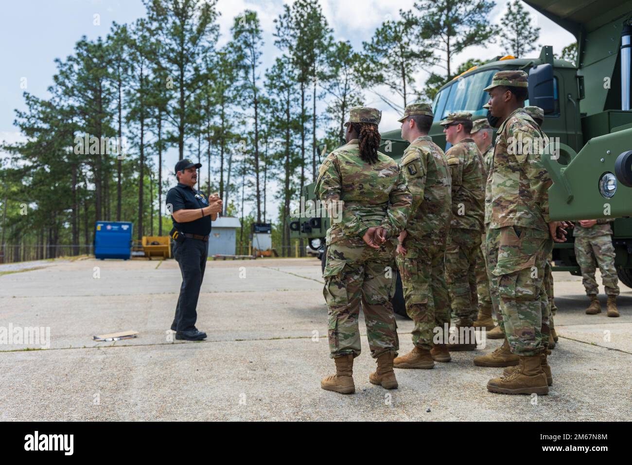 Soldiers of the 289th Engineer Company receive a briefing from U.S