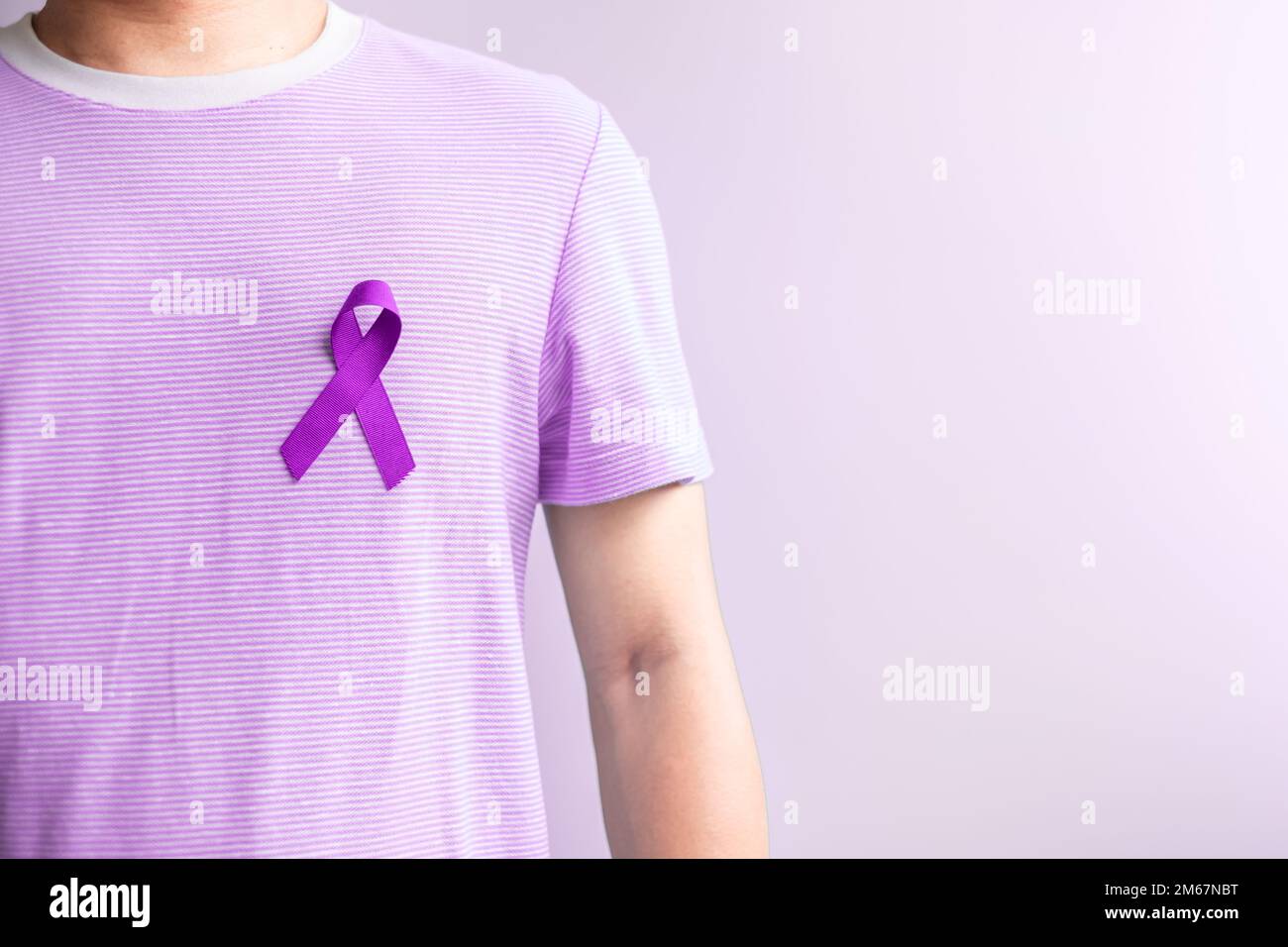purple ribbon for cancer day, lupus, Pancreatic, Esophageal, Testicular cancer, world Alzheimer, epilepsy, Sarcoidosis, Fibromyalgia and domestic viol Stock Photo