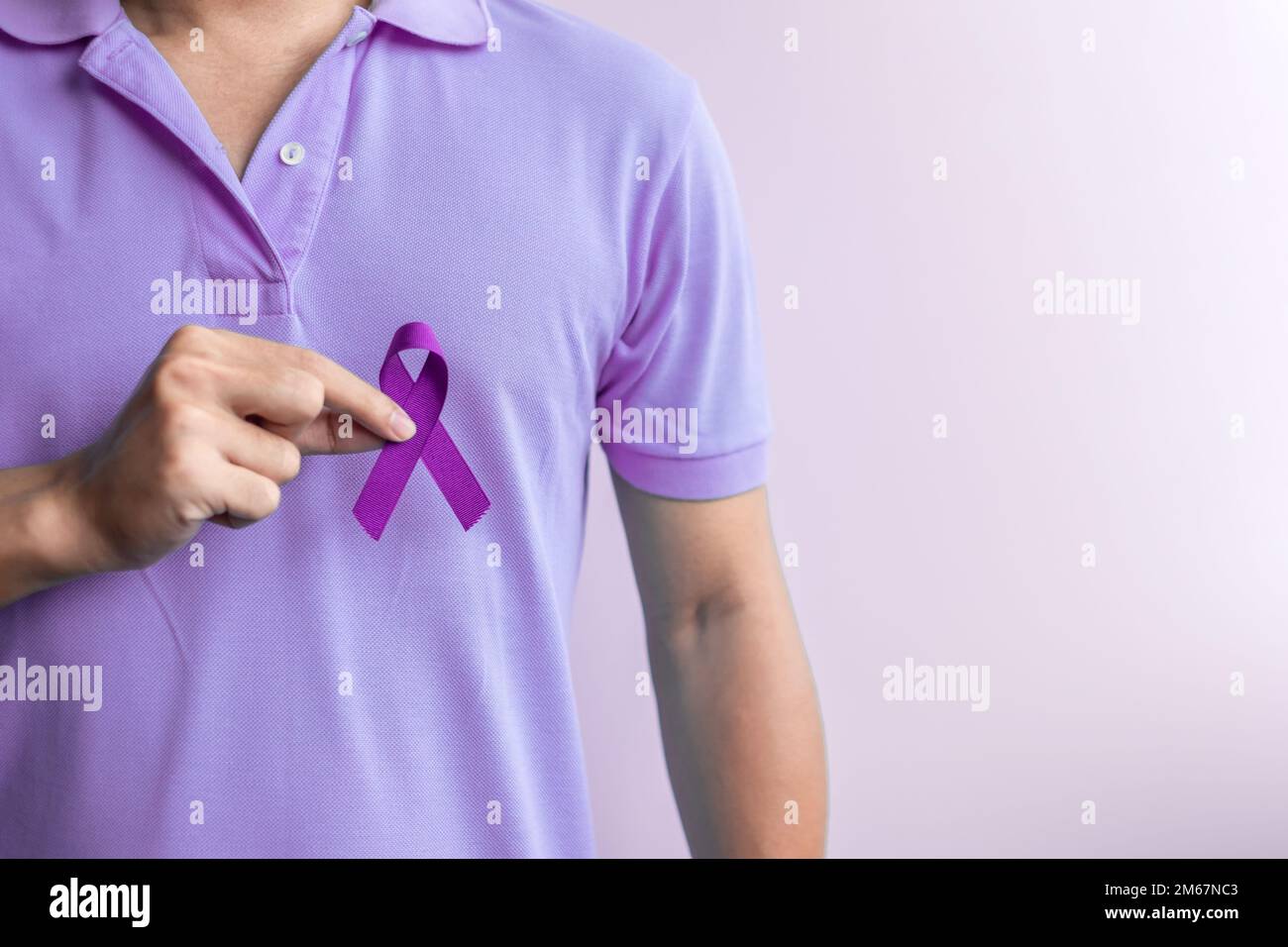 purple ribbon for cancer day, lupus, Pancreatic, Esophageal, Testicular cancer, world Alzheimer, epilepsy, Sarcoidosis, Fibromyalgia and domestic viol Stock Photo