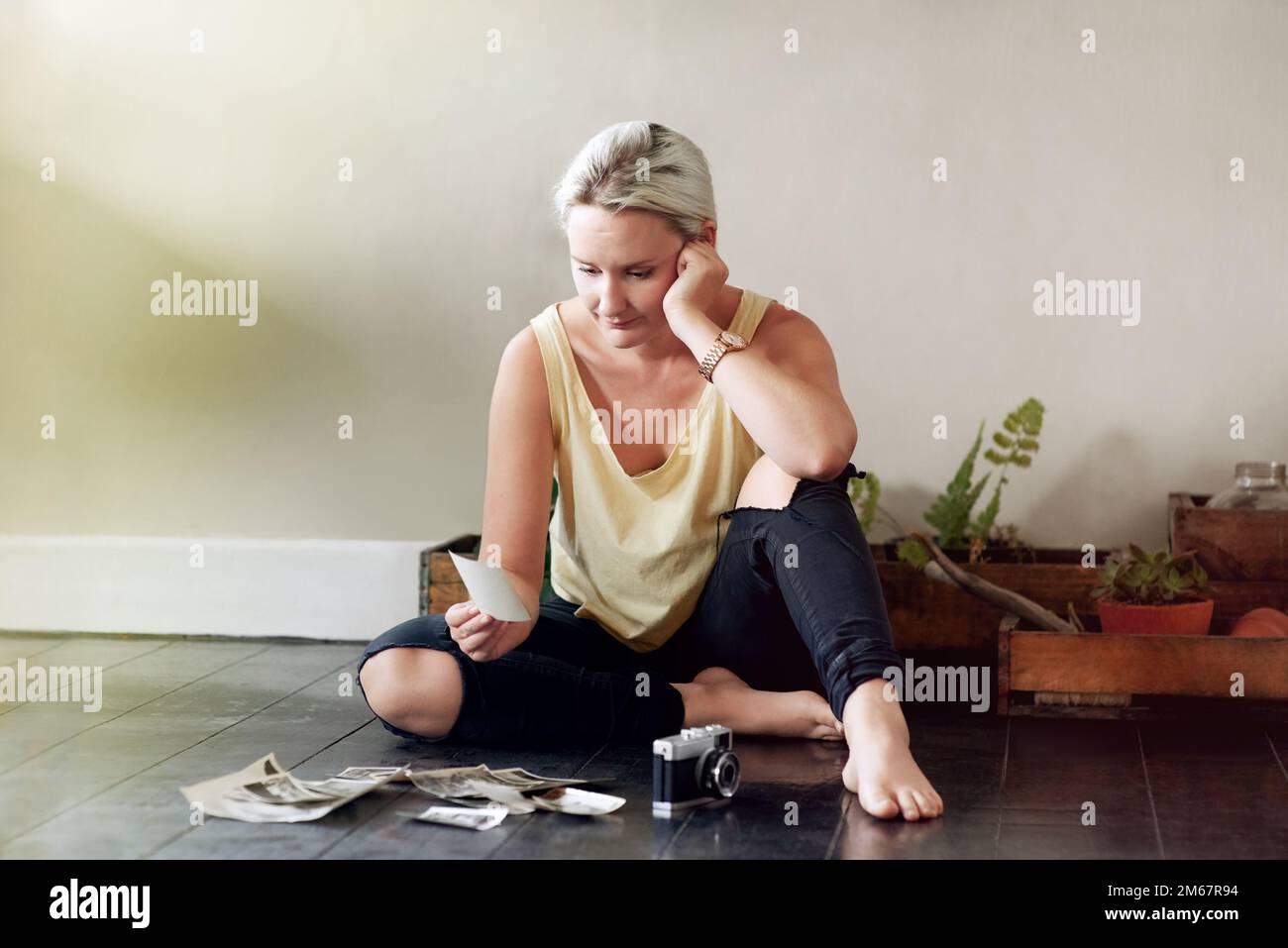 Remember Sitting Remember the time...a young woman looking at old photographs while ...
