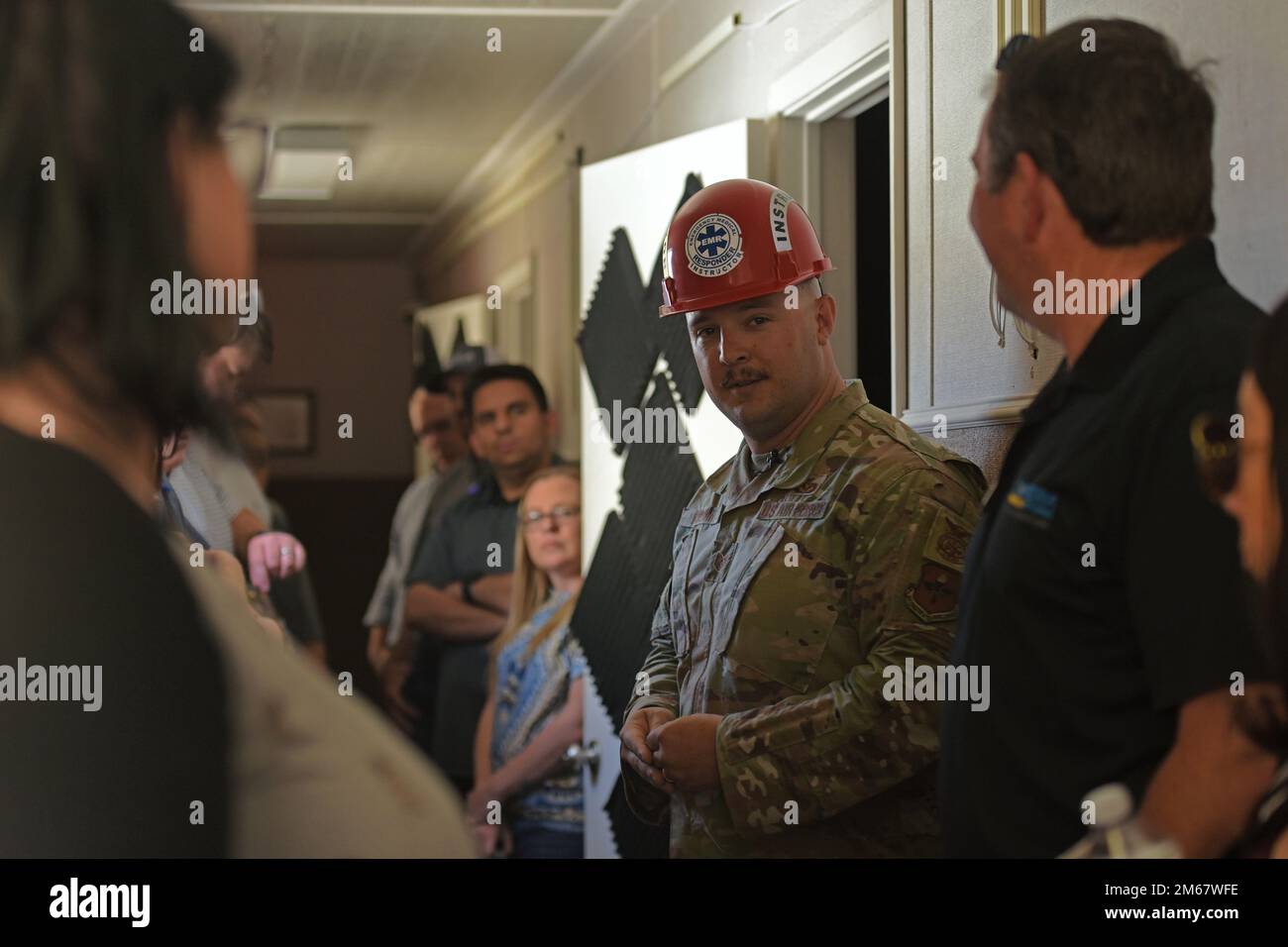 U.S. Air Force Tech. Sgt. Andrew Fruehan, 312th Training Squadron fire instructor and noncommissioned officer in charge, explains how community relationships has benefited the emergency medical responder course for the Leadership San Angelo base tour, Goodfellow Air Force Base, Texas, April 14, 2022. Two $60,000 medical manikins were donated to the Louis F. Garland Department of Defense Fire Academy from a local university; these manikins simulate real life EMR situations to test student knowledge. Stock Photo