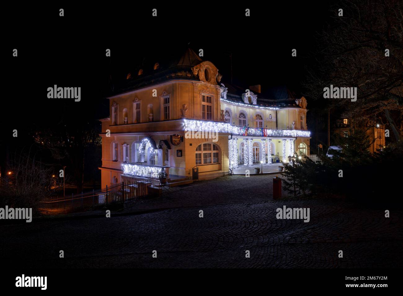 Building of small spa hotel Saint Antonius at night - Czech spa town Marianske Lazne (Marienbad) - Stock Image