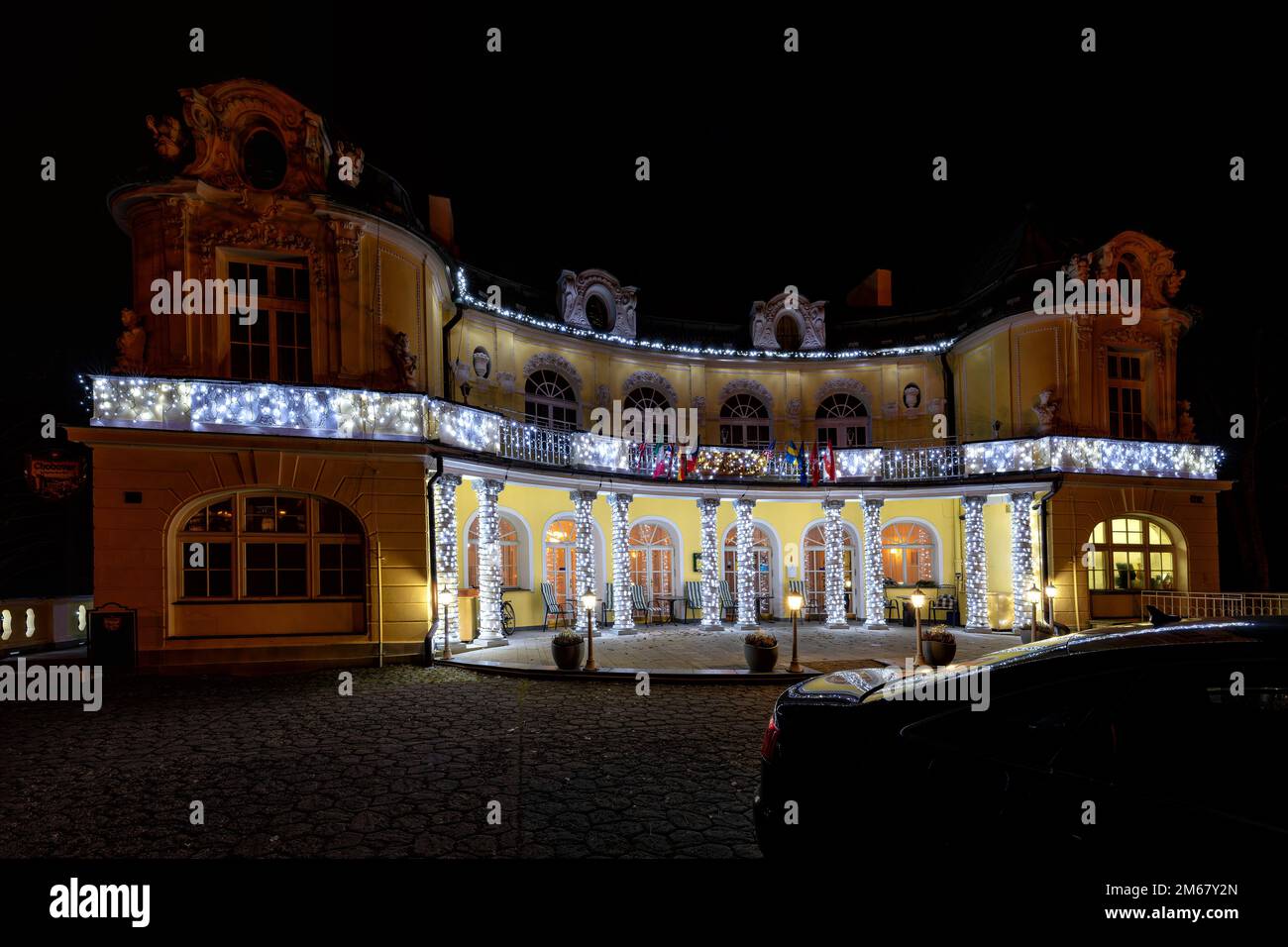Building of small spa hotel Saint Antonius at night - Czech spa town Marianske Lazne (Marienbad) - Stock Image