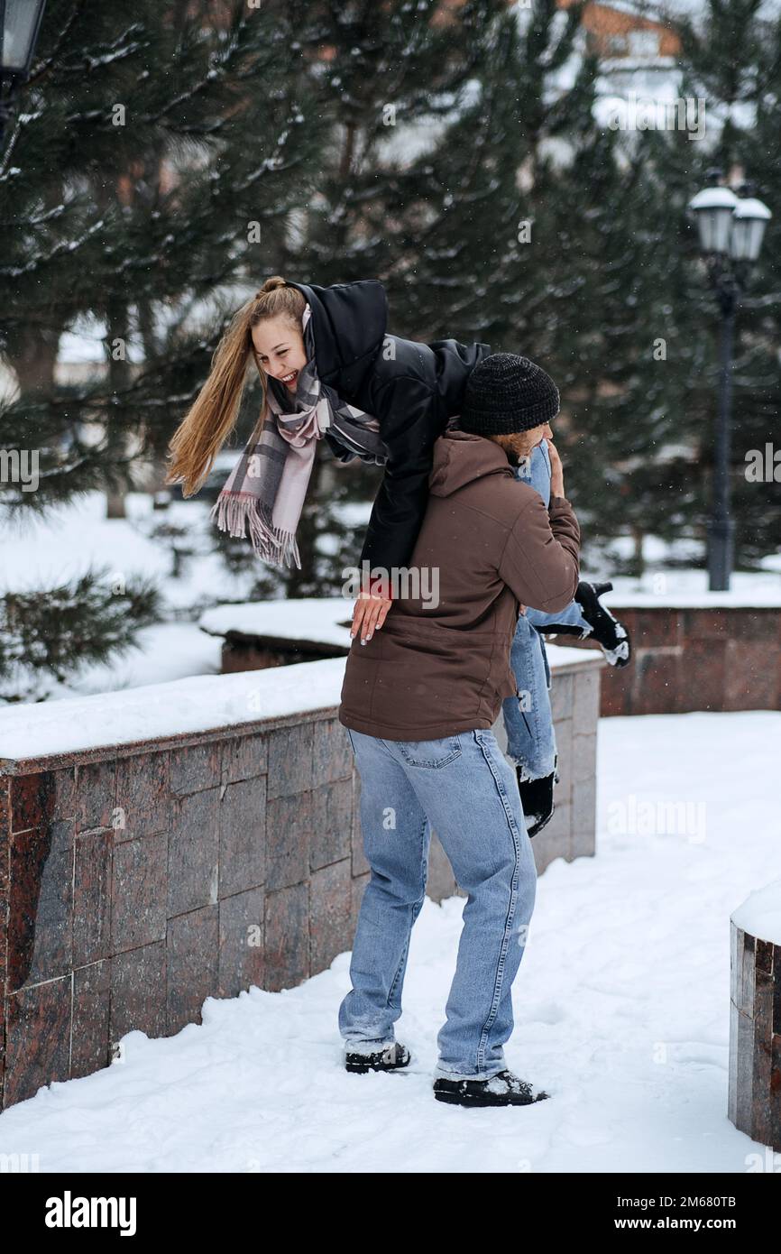 Outdoors Valentines Day Date Ideas for Couples. Winter love story. Cold  season dating for couples. Young couple in love having fun in winter city  Stock Photo - Alamy