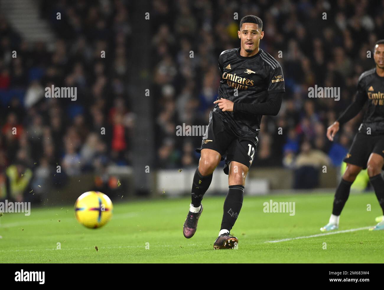 William Saliba of Arsenal during the Premier League match between Brighton & Hove Albion and  Arsenal at The American Express Community Stadium , Brighton , UK - 31st December 2022 Photo Simon Dack/Telephoto Images.  Editorial use only. No merchandising. For Football images FA and Premier League restrictions apply inc. no internet/mobile usage without FAPL license - for details contact Football Dataco Stock Photo