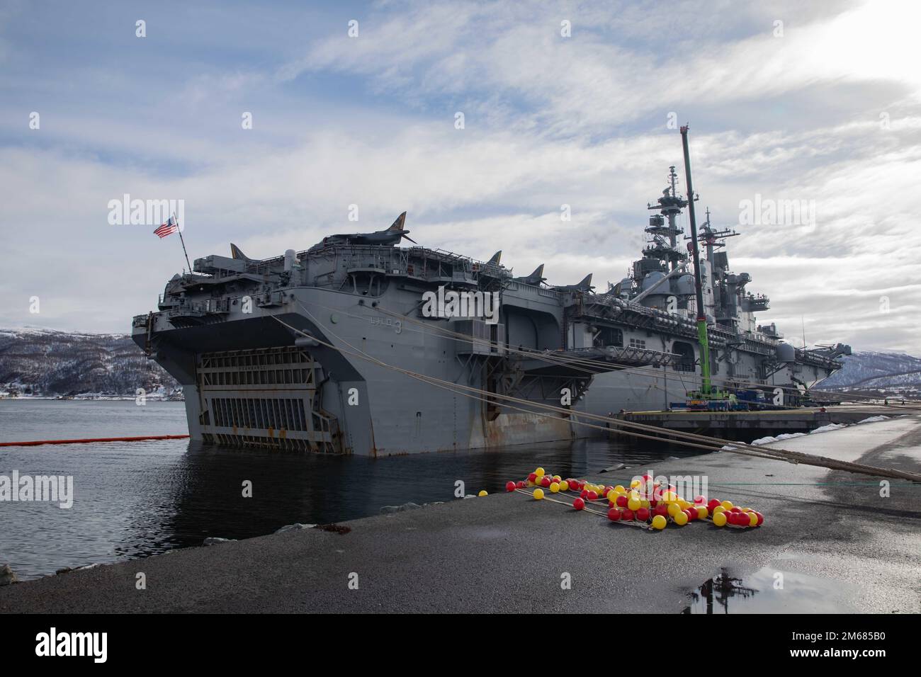TROMSO, Norway (April 15, 2022) – The Wasp-class amphibious assault ship USS Kearsarge (LHD 3) moored in port in Tromso, Norway, during a scheduled port visit, April 15, 2022. Kearsarge, flagship of the Kearsarge ARG/MEU team, is on a scheduled deployment under the command and control of Task Force 61/2 while operating in U.S. Sixth Fleet in support of U.S., Allied and partner interests in Europe and Africa. Stock Photo