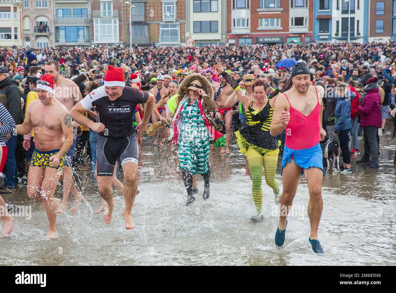 People taking part in the traditional 'Bain de Givres' as part of the New Year's celebrations on January 1 Stock Photo