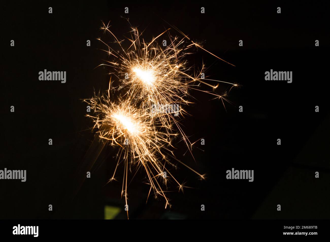 Sparkler at night at New Year's Eve Stock Photo