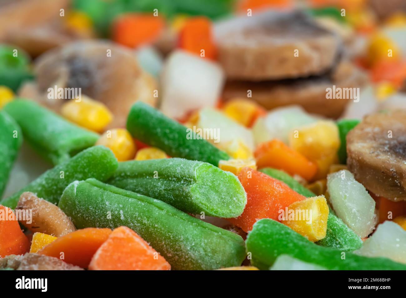 Frozen vegetables. Frozen vegetable mixture of carrots, corn and peas