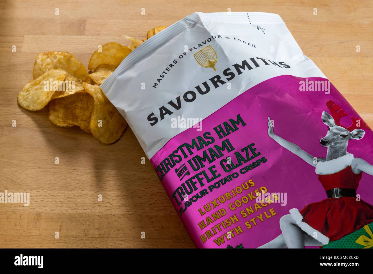 A bag of Savoursmiths Christmas Ham with Umami Truffle Glaze flavour potato crisps. Stock Photo