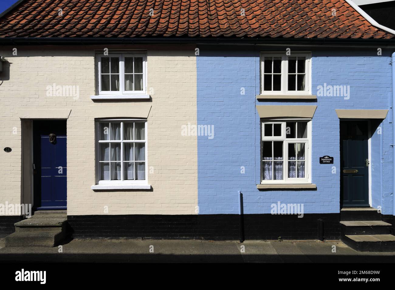 Coloured housing in Halesworth market town, Suffolk, England, UK Stock