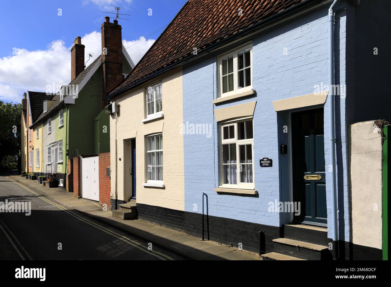 Coloured housing in Halesworth market town, Suffolk, England, UK Stock