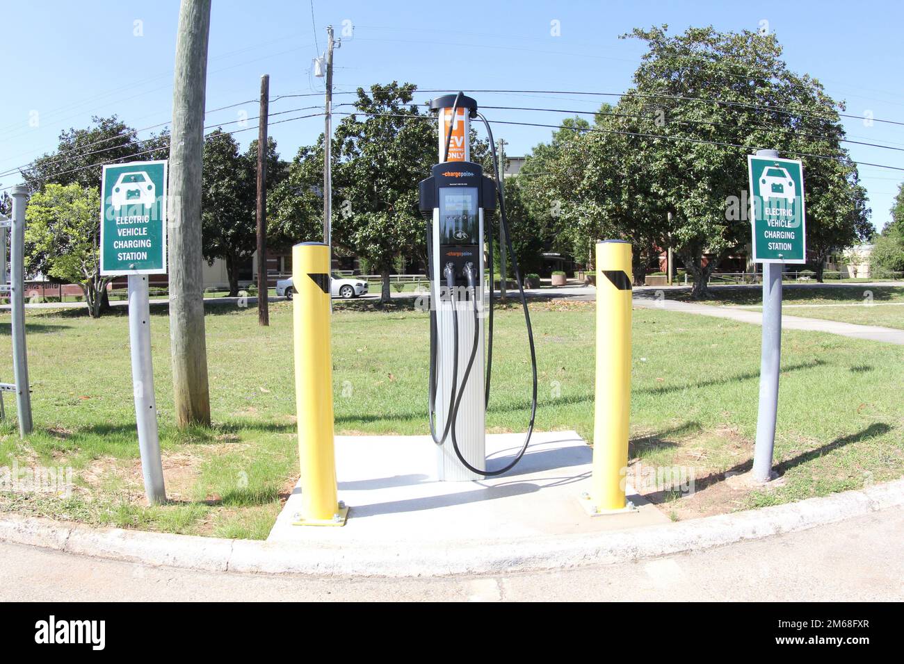 The electric vehicle charging station in front of Bldg. 5700, the Soldier Service Center. Only vehicles receiving the service are allowed to park in the two spaces next to the charger. Stock Photo