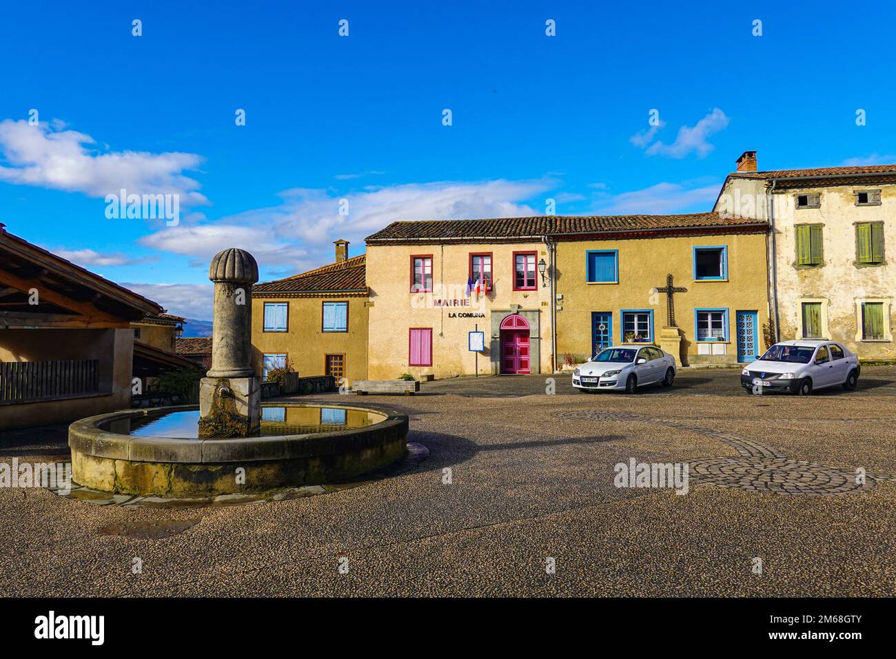 Fountain with goldfish in The small village and castle at Roqefixade