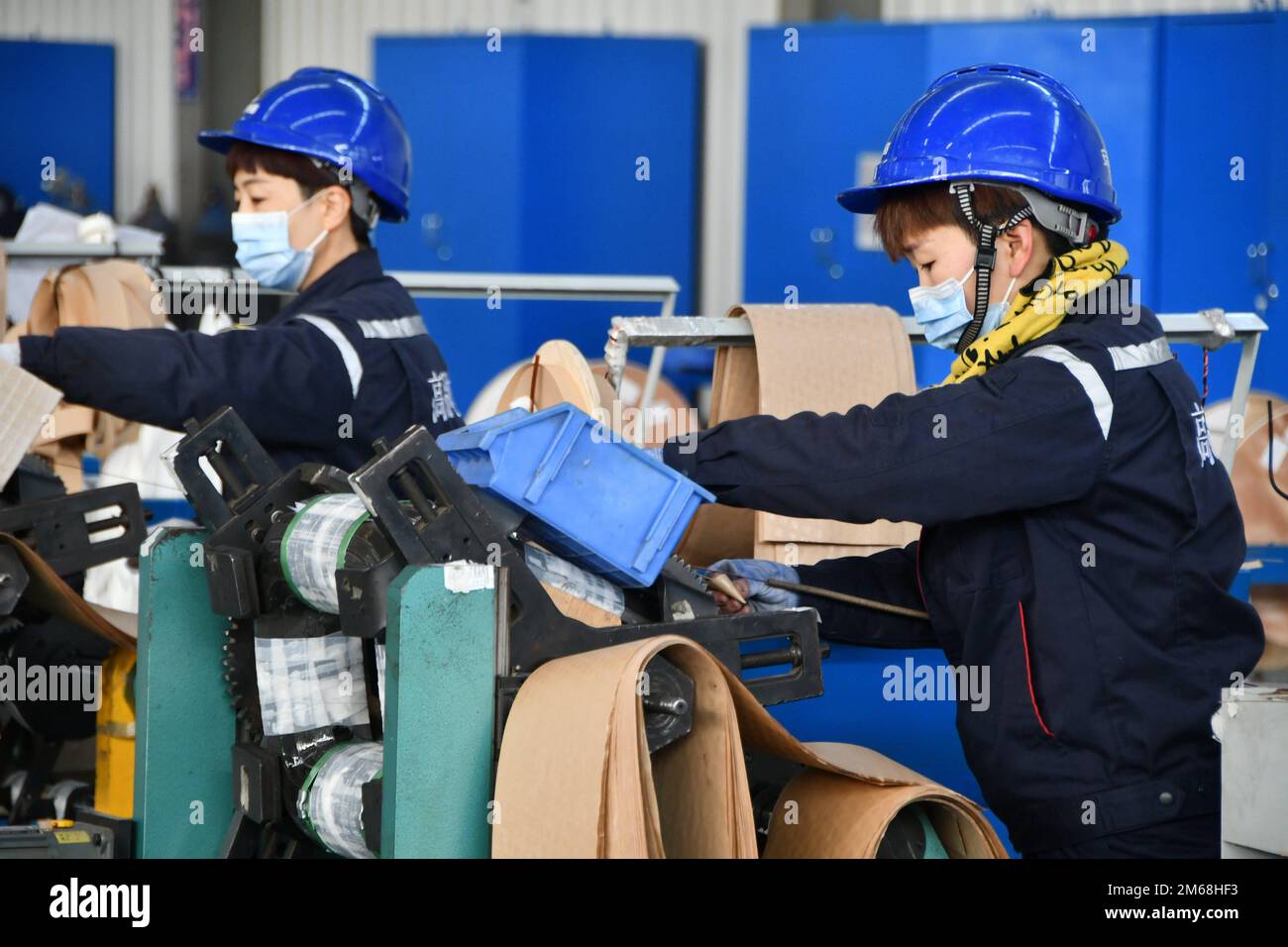 HANDAN, CHINA JANUARY 3, 2023 Workers assemble transformers at a