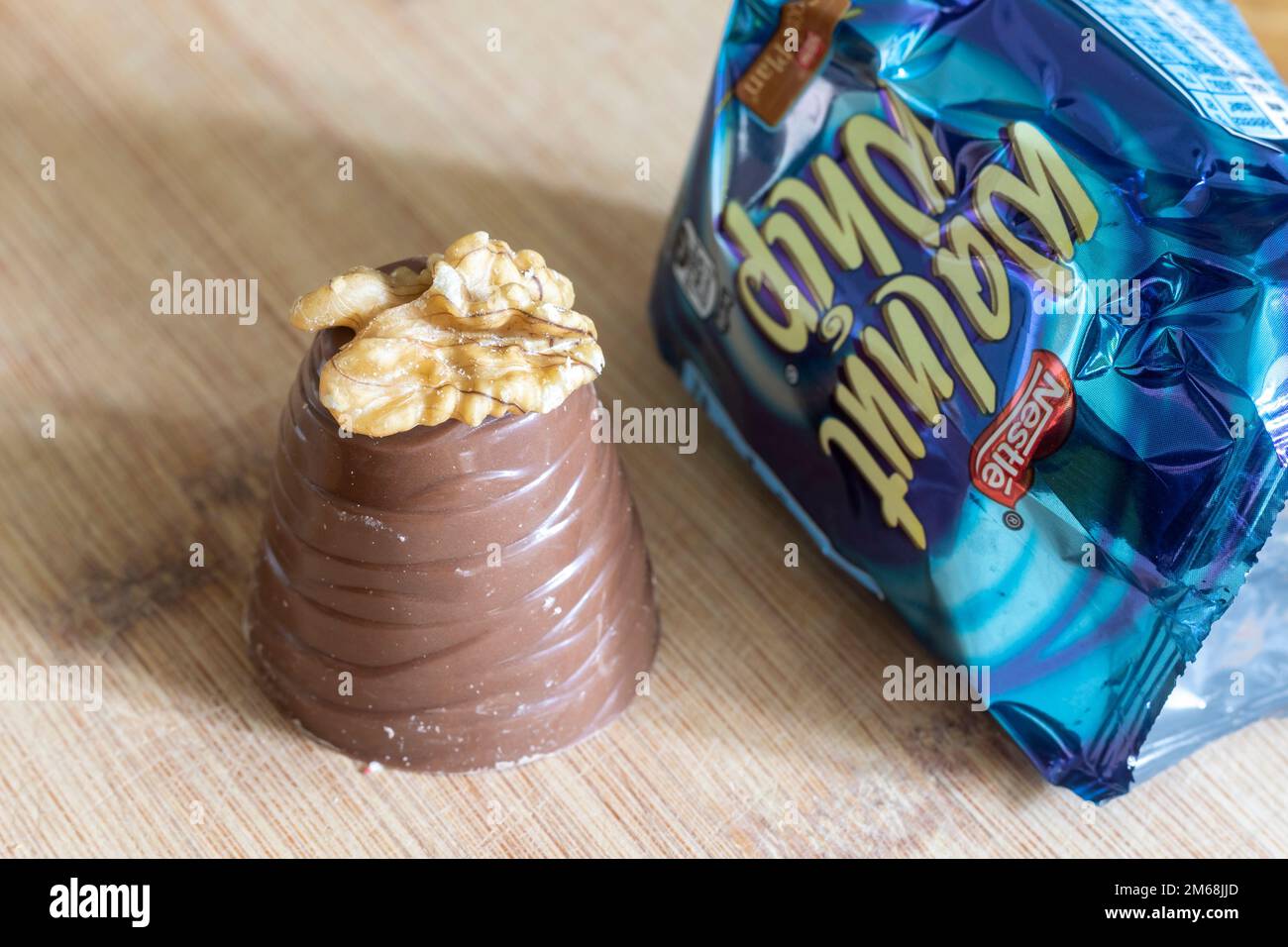 A Walnut whip, a sweet treat made by Nestle consisting of chocolate filled with marshmallow and topped with a walnut. Stock Photo