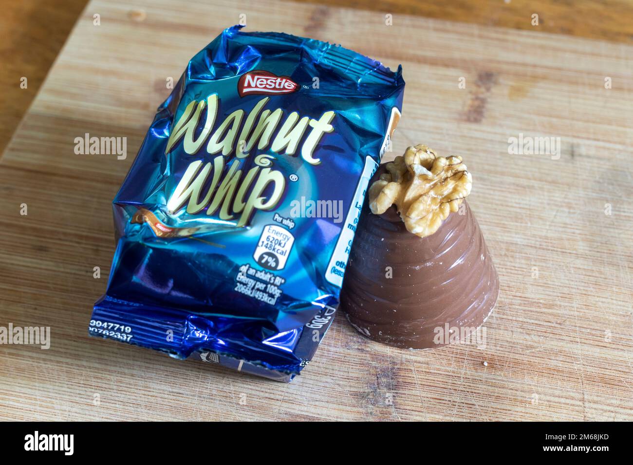 A Walnut whip, a sweet treat made by Nestle consisting of chocolate filled with marshmallow and topped with a walnut. Stock Photo