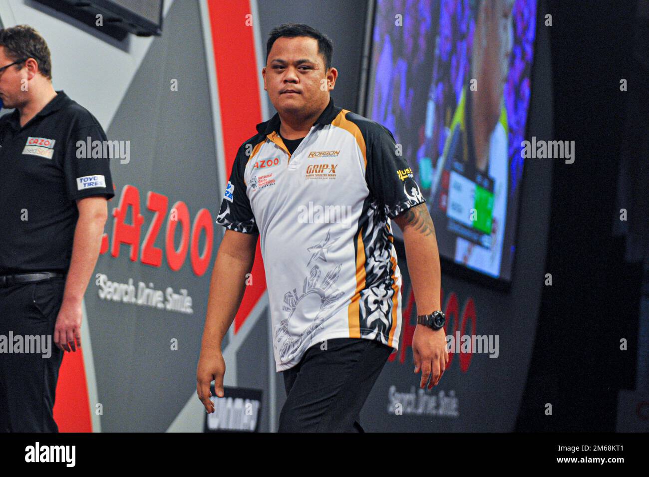 LONDON, ENGLAND - DECEMBER 19: Paolo Nebrida of The Philippines looks on  during Day Five of the Cazoo World Darts Championship at Alexandra Palace  on December 12, 2022 in London, England. (Photo